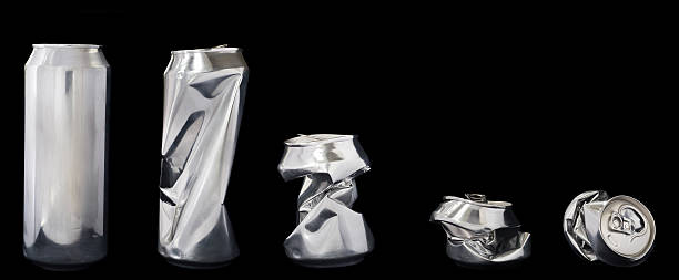 Line up of beer cans Silver metal / tin beer or soda can. crushed stock pictures, royalty-free photos & images