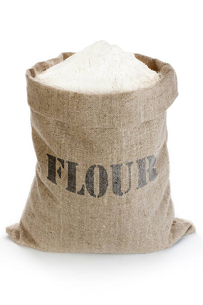 Linen sack with flour stock photo