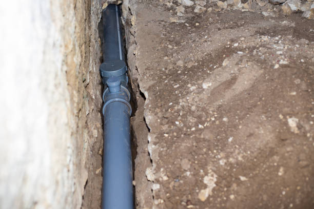 lining sewage with plastic pipes, drainage of waste water from the house stock photo