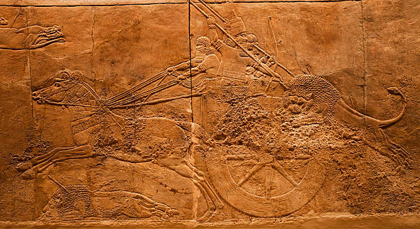 Lions hunting in Ancient Assyria stock photo