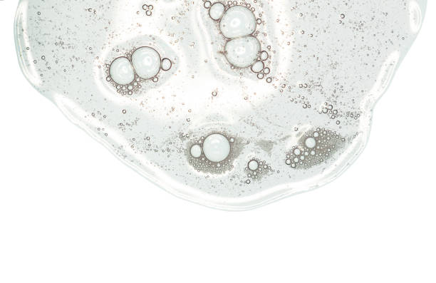 Liquid gel or serum on microscope screen isolated background stock photo