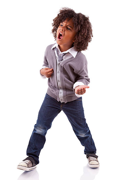 Little african american boy playing air guitar Little african american boy playing air guitar, isolated on white background pardo brazilian stock pictures, royalty-free photos & images