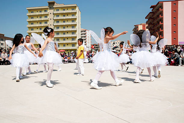 Little Angels Show Izmir, Turkey - April 23, 2010:Little cute girls with angel costume in school performance angel 8 stock pictures, royalty-free photos & images