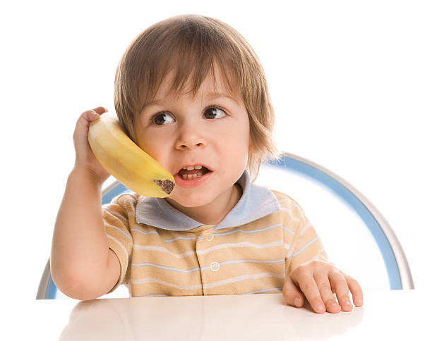少年とバナナ - バナナ電話 ストックフォトと画像