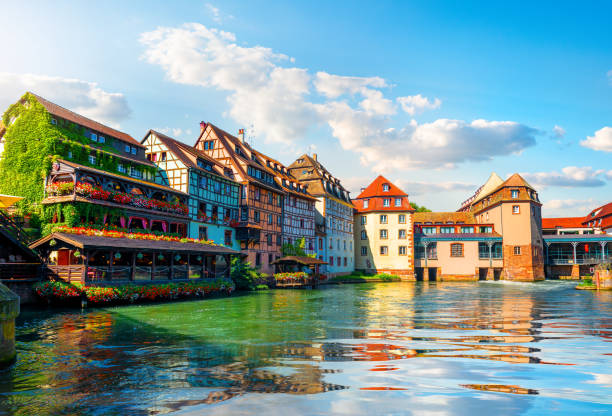 Little France in Strasbourg Picturesque district Petite France in Strasbourg, houses on river strasbourg stock pictures, royalty-free photos & images