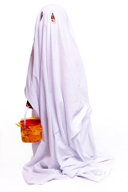 Little ghost a child in a ghost costumea little over exposed around the edges. ghost boy stock pictures, royalty-free photos & images