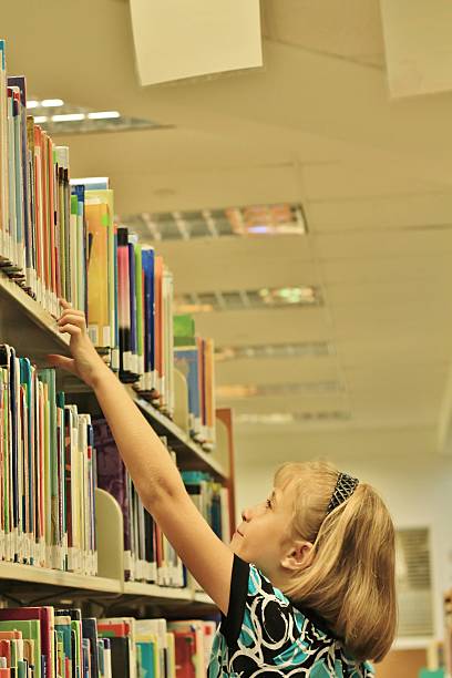 Little Girl at the Library stock photo
