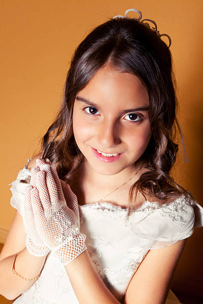 Little Girl in her First Communion Day stock photo