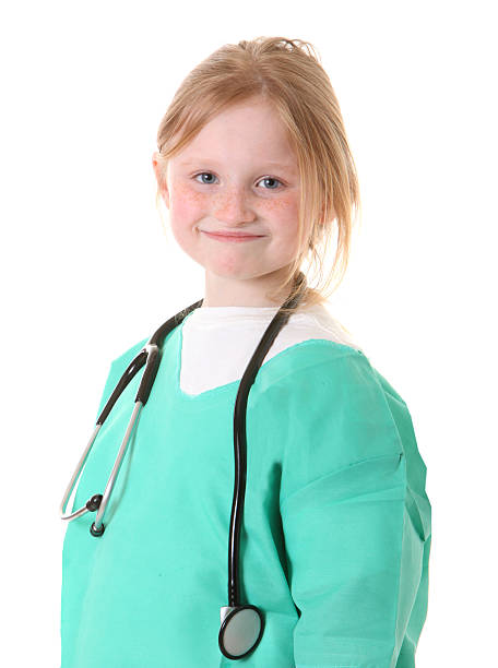 little girl nurse stock photo