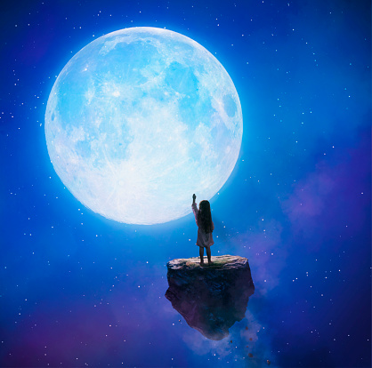 Little Girl Touching The Moon Stock Photo - Download Image Now - iStock