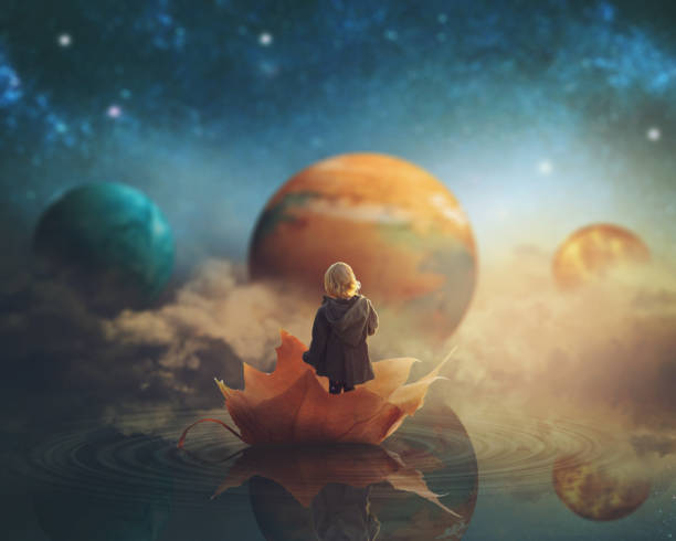 Little girl travelling through dream world, floating on a big fallen leaf; imagination/fantasy background; Elements of this image furnished by NASA Little girl travelling through dream world, floating on a big fallen leaf; imagination/fantasy background; Elements of this image furnished by NASA fortune telling photos stock pictures, royalty-free photos & images