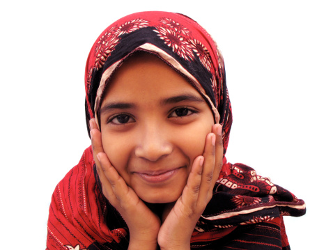 Muslim girl with sweet smile on her face