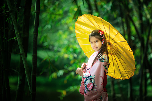 Little girl with japanese heritage wearing kimono