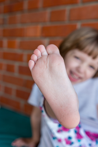 Little Girls Feet Stock Photo 