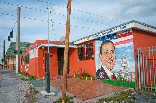 Miami, USA. December 22, 2009. A retaurant in Little Haiti exhibits a mural in suport of presidential candidate Barak Obama.