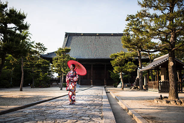 Little miss Geisha Young woman posing in a kimono in Kyoto, Japan kyoto prefecture stock pictures, royalty-free photos & images