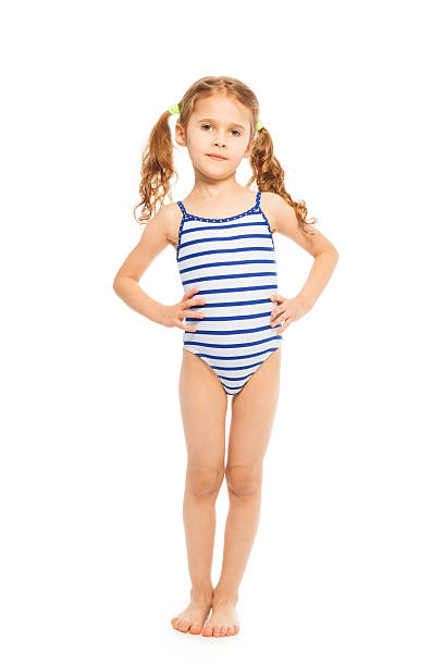 Little model in stripped swimming suit Little model standing full length in stripped swimming suit isolated on white little girls in bathing suits stock pictures, royalty-free photos & images