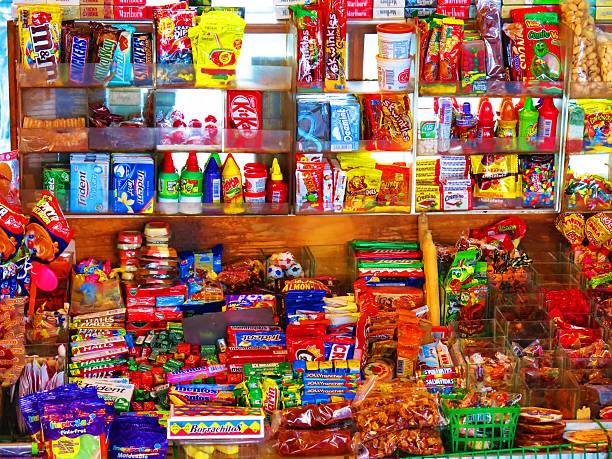 little shop with sweets in Mexico Guanajuato, Mexico - December 15, 2015: A little shop on a cart selling candies and other sweets candy store stock pictures, royalty-free photos & images