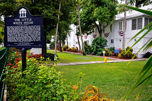 Little White House in Key West Built in 1890 as quarters for Navy officers, the "Little White House," located at the southwestern end of the key, was later used by six US Presidents for business and pleasure. This place is listed on the National Register of Histroic Places and is maintained as a Florida Hertitage Landmark.  mike cherim stock pictures, royalty-free photos & images