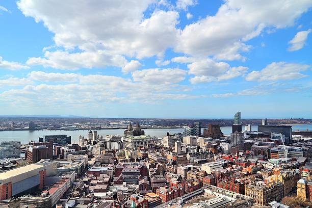 Liverpool, England Liverpool - city in Merseyside county of North West England (UK). Aerial view with downtown and famous Pier Head UNESCO World Heritage Site. river mersey liverpool stock pictures, royalty-free photos & images