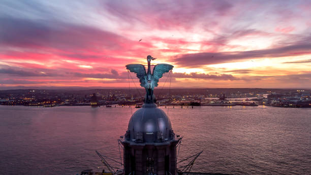 Liverpool liver birds in the sunset Liverpool liver bird aerial shot taken in the sunset (3 shot bracket) pierhead liverpool stock pictures, royalty-free photos & images