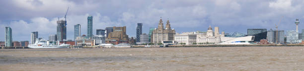 Liverpool's UNESCO listed waterfront including modern office buildings, Liverpool's Anglican Cathedral, the Three Graces and the new Museum of Liverpool. Liverpool's UNESCO listed waterfront including modern office buildings, Liverpool's Anglican Cathedral, the Three Graces and the new Museum of Liverpool. cunard building liverpool stock pictures, royalty-free photos & images