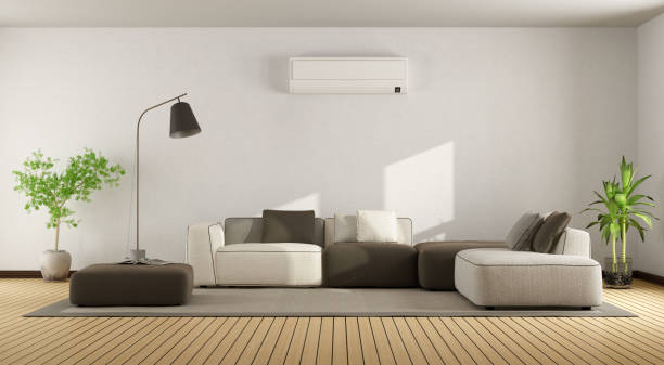 Living room with sofa and air conditioner stock photo