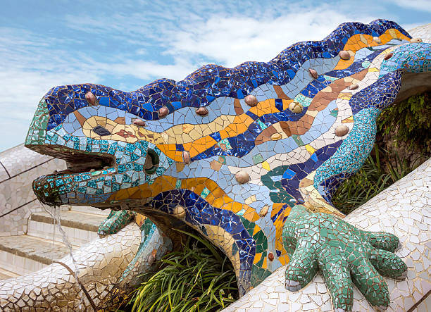Lizard of Gaudi Lizard of Gaudi mosaic in park Guell of Barcelona antoni gaudí stock pictures, royalty-free photos & images
