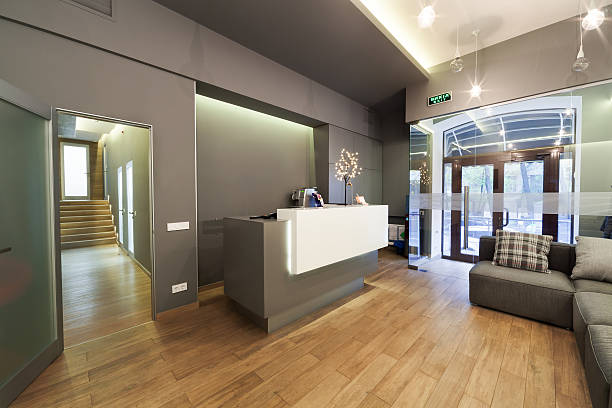 Lobby entrance with reception desk in a dental clinic. stock photo