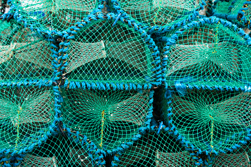 Closeup of blue and green lobster pots