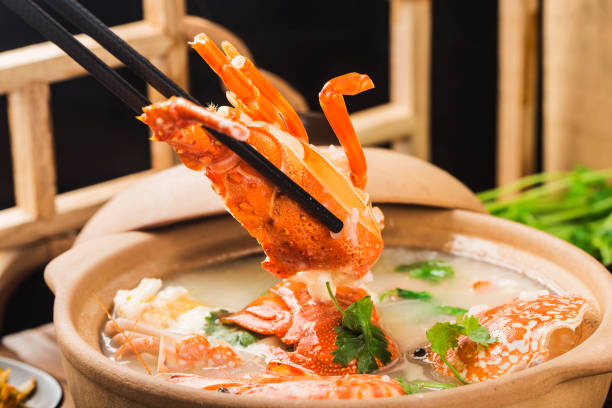 Lobster Seafood congee in a casserole stock photo