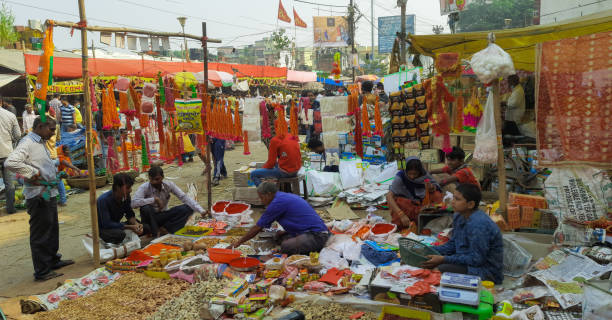 Local new market crowd on the eve of Diwali and Chhath puja. People selling & purchasing festival and worship materials at local shop. Katihar,Bihar/India-20/11/2020; Local new market crowd on the eve of Diwali and Chhath puja. People selling & purchasing festival and worship materials at local shop. chhath stock pictures, royalty-free photos & images