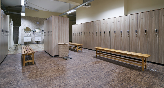 Locker Room With Wood Benches And Wooden Lockers Stock Photo