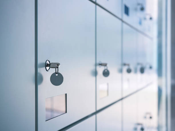 Lockers with key in Locker Room perspective stock photo
