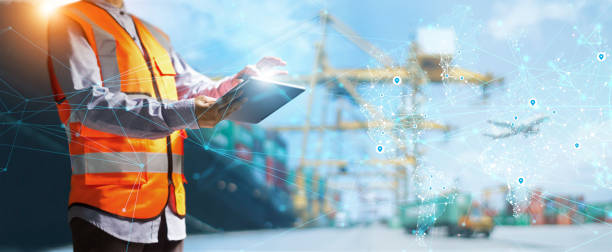 Logistic and transport. Industrial of global logistic network distribution. Worker use digital tablet data exchanges customer on world map networking. Fast instant shipping of online goods orders. stock photo