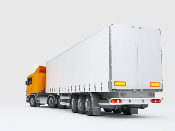Logistics concept. Cargo truck transporting goods isolated on white background. Rear view. 3D illustration Big cargo truck transporting goods isolated on white background. Rear perspective view. 3D illustration semi truck back stock pictures, royalty-free photos & images