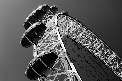 London, England - May 2, 2011: close-up of the London Eye during a bright spring day in London. Black and white image.