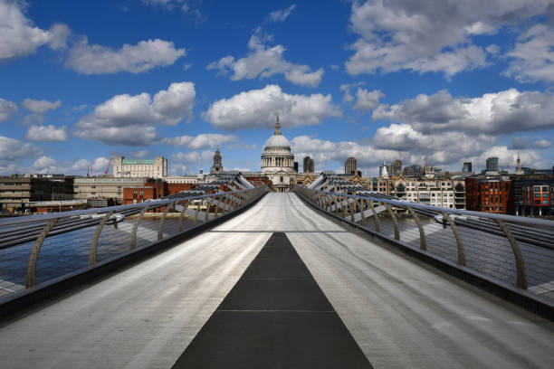 London pandemic - St Paul's and Millennium Bridge St Paul's and the empty Millennium Bridge  - popular tourist destination in central London - deserted at the height of the covid 19 lock down central london stock pictures, royalty-free photos & images