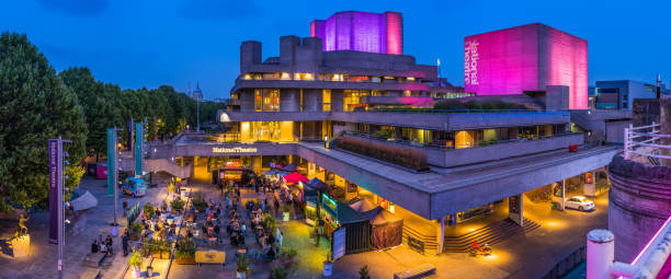 london people outdoor restaurants national theatre southbank illuminated night panorama - south bank london stockfoto's en -beelden