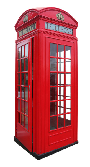 Red phone booth from London isolated on white background.