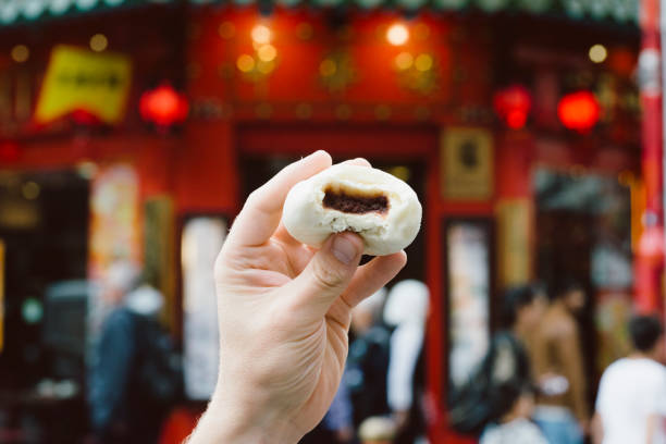 London Street Food - chinese bun Street food bought from KERB London street food market chinatown stock pictures, royalty-free photos & images