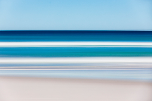 Long exposure of beach on bright sunny day