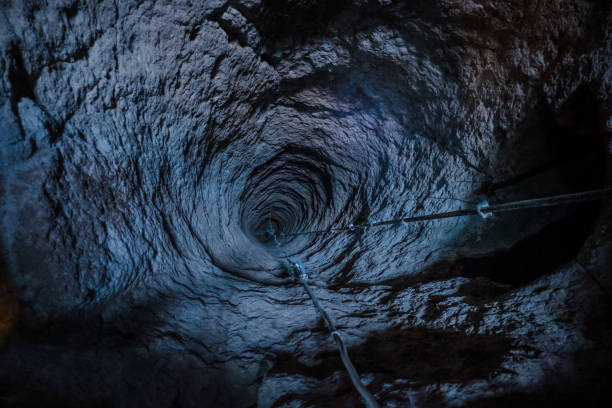 Long hole tunnel through gypsum mine in Cappadocia, Turkey. stock photo
