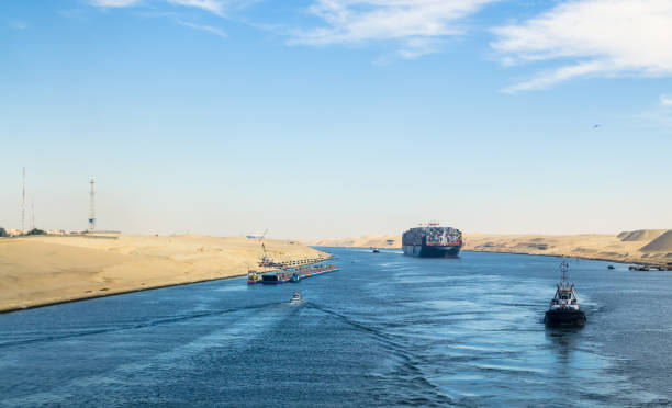 Long pantone bridge, transported by tugboats along western bank of Suez Canal stock photo