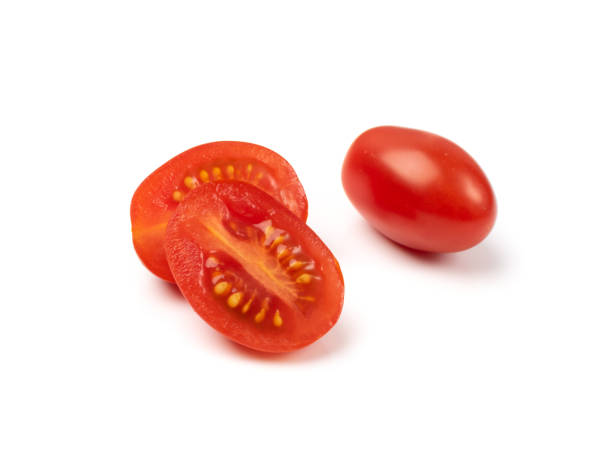 Long Plum Tomato Group Isolated, Fresh Small Cherry Tomatoes stock photo