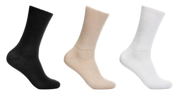 Long socks of various shades on mannequin isolated on white stock photo