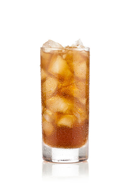 A long tall glass of ice cold ice tea on a white background Glass of Refreshing Ice Tea highball glass stock pictures, royalty-free photos & images