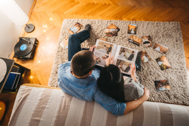 909 Couple Looking At Photo Album Stock Photos, Pictures & Royalty-Free  Images - iStock