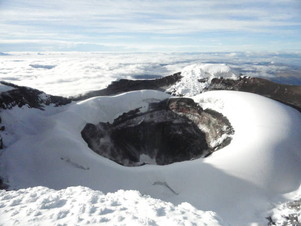Looking down into the crater of Cotopaxi, an active stratovolcano in the Andes Mountains, Ecuador stock photo