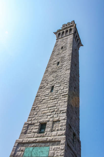 Looking up at the Pilgrim Monument in Provincetown Cape Cod that commemorates the Mayflower Pilgrims first landing in the New World  pilgrims monument stock pictures, royalty-free photos & images